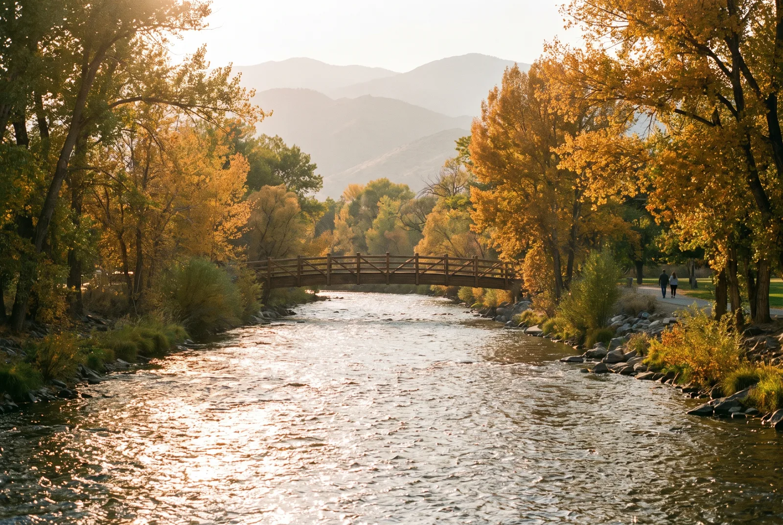 The Truckee River flowing through a golden tree-lined park in Reno